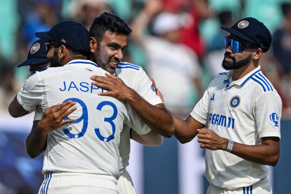 Jasprit Bumrah hugs R Ashwin after his 500th wicket