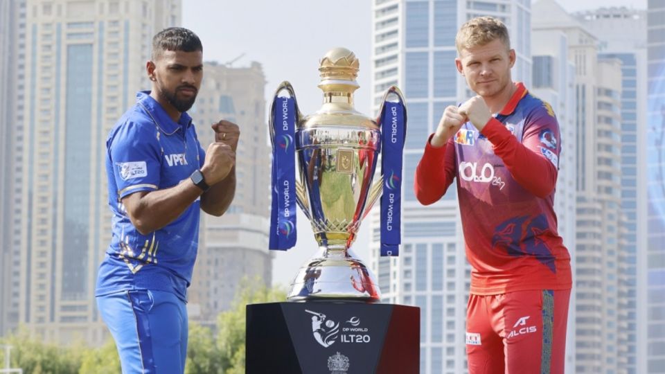 Nicholas Pooran and Sam Billings pose with the ILT20 trophy
