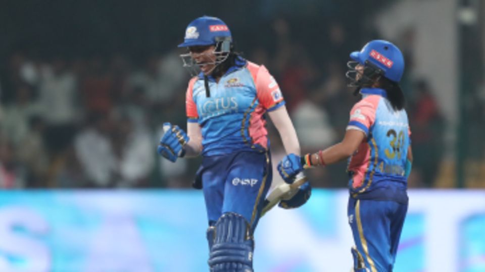 S Sajana roars in delight after slamming her first ball - and the last of the innings - for six to take Mumbai Indians home