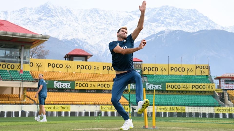 James Anderson bowls with the Himalayas in the background