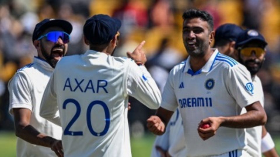 R Ashwin shares a laugh with Mohammed Siraj and Axar Patel after getting his five-for