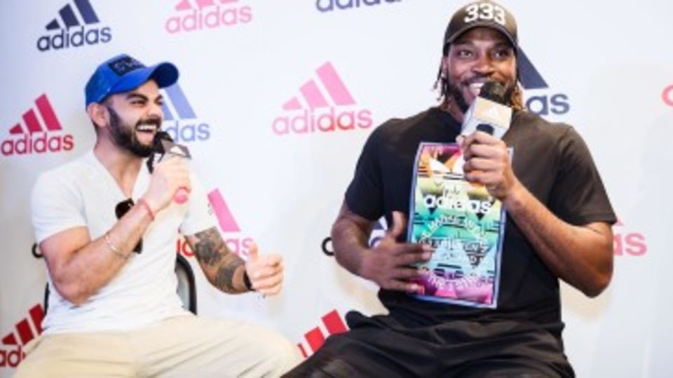 Virat Kohli and Chris Gayle at a sponsor's event in a mall in Bengaluru