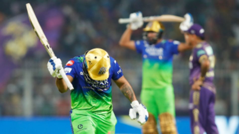 Karn Sharma reacts to falling, caught and bowled off Starc, with three runs needed off two balls
