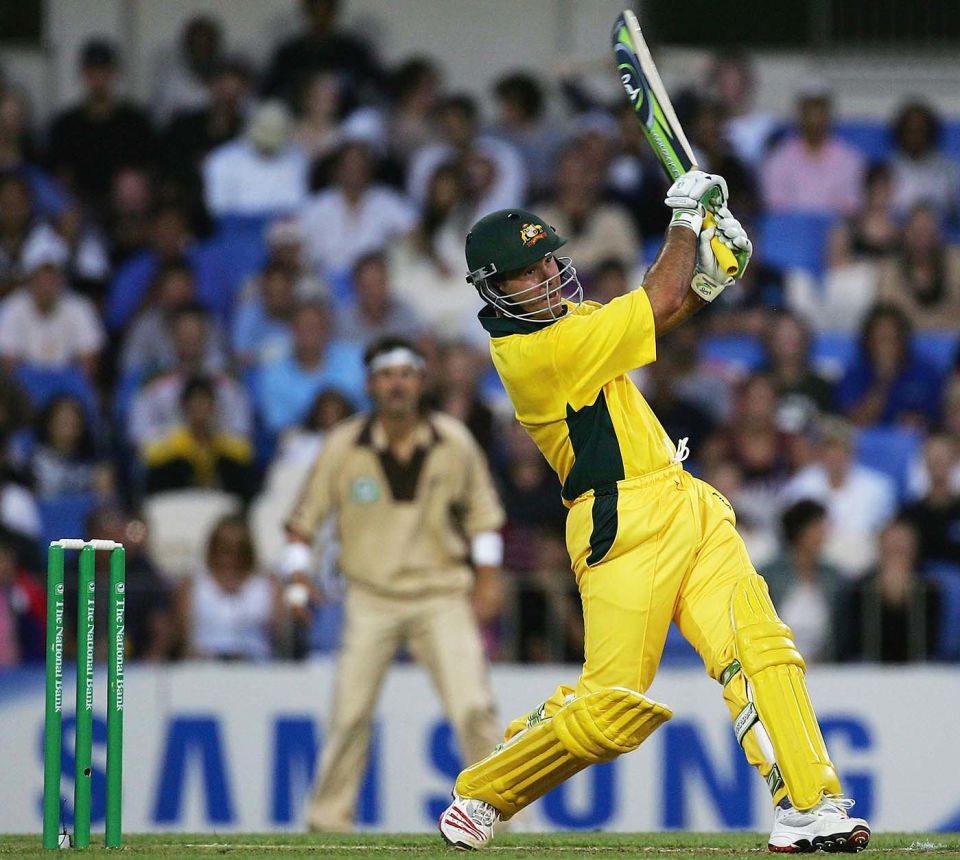From lark to large: T20 has come a long way from its beginnings in the early 2000s. Above, Ponting bats in the very first international, in 2005, with a New Zealand fielder in retro kit and headband looking on