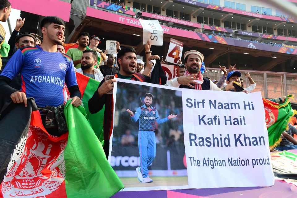 R is for Rashid in the stands at South Africa vs Afghanistan in the World Cup in Ahmedabad last year