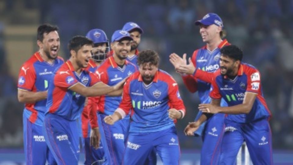 Kuldeep Yadav is pumped after the wicket of Donovan Ferreira