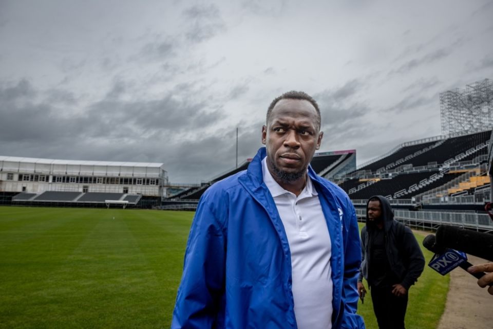 Here's a picture of Usain Bolt looking all moody (and a bit Lance Gibbsian even - cricket connection, see?) against a moody sky at Eisenhower Park, the New York venue for the T20 World Cup