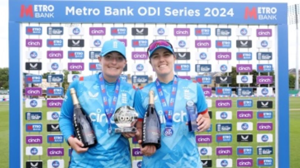 Player of the match Nat Sciver-Brunt and player of the series Sophie Ecclestone pose with their gongs