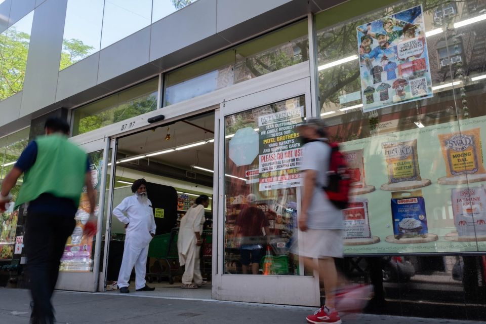 A supermarket in Jackson Heights is selling India-Pakistan jerseys but the buzz is far from palpable