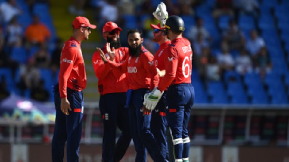 Adil Rashid celebrates the wicket of Mehran Khan