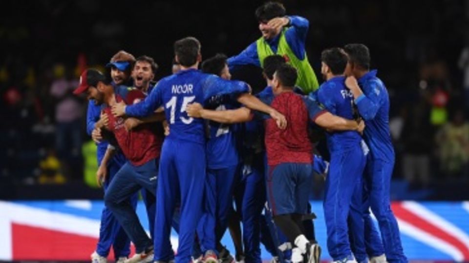 Afghanistan celebrate their first ever win over Australia