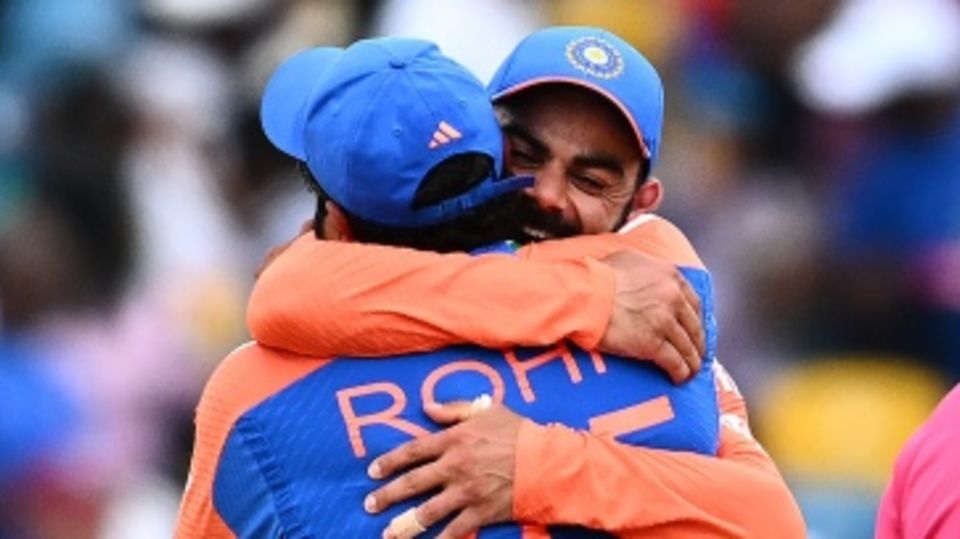 Rohit Sharma and Virat Kohli hug it out