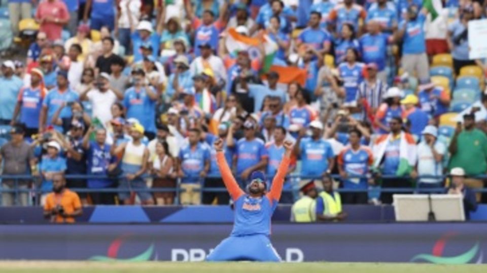 Rohit Sharma drops to his knees in celebration