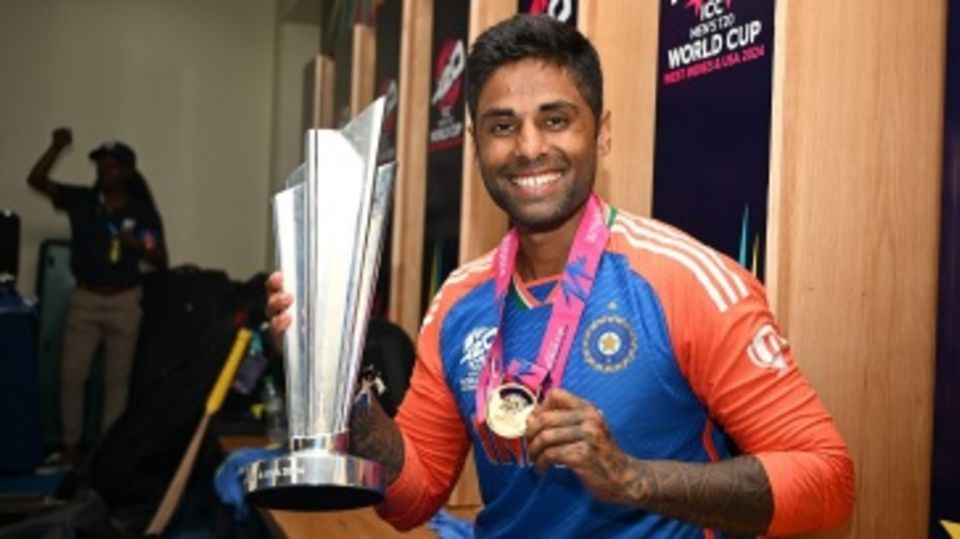 Suryakumar Yadav is all smiles with the T20 World Cup trophy and the winners' medal