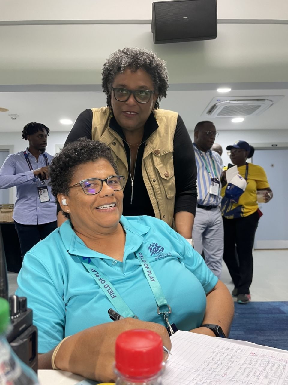 Another cricket-loving PM: Mia Mottley, prime minister of Barbados (top) catches up with schooldays friend Suzanne Belle, the press scorer at Kensington Oval