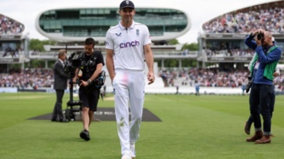 An emotional James Anderson walks off the field