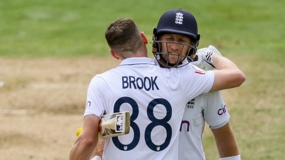 Harry Brook is congratulated by Joe Root after his first century at home