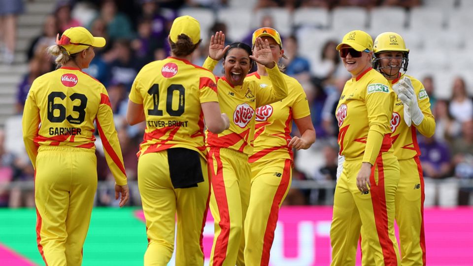 Alana King celebrates after taking a wicket with her first ball