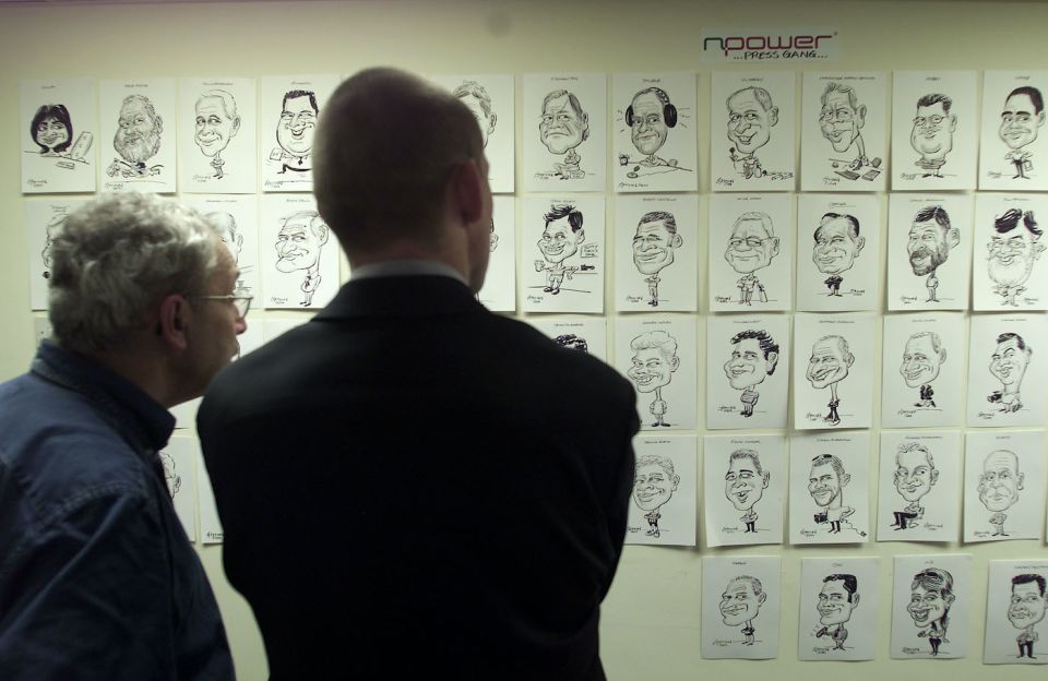 Caricatures of journalists line the walls of the press box at Headingley