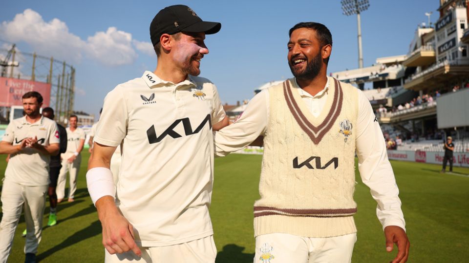 Rory Burns and Ryan Patel celebrate together