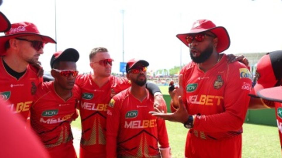 Kieron Pollard leads Trinbago Knight Riders' team huddle