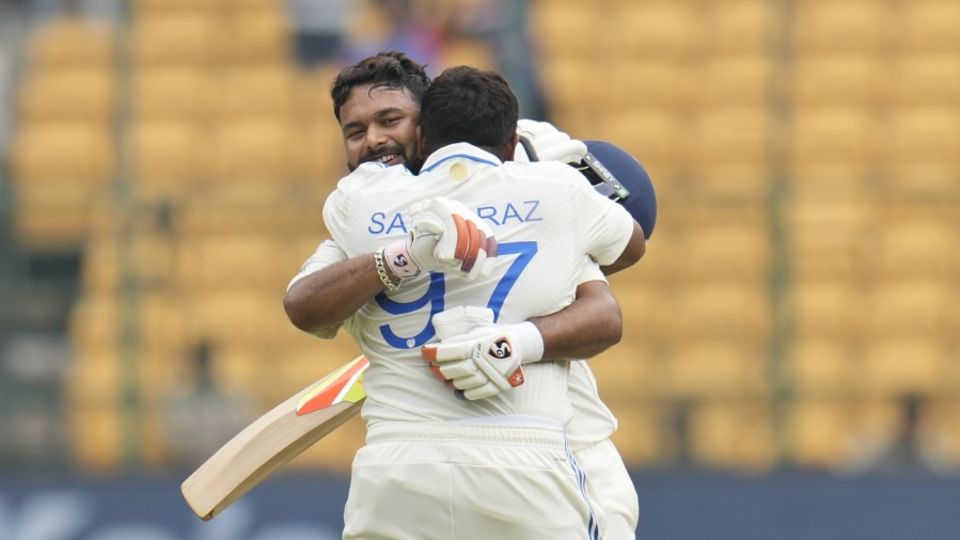 Sarfaraz Khan celebrates his century with Rishabh Pant