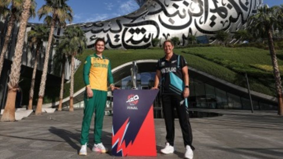 South Africa captain Laura Wolvaardt and New Zealand captain Sophie Devine with the T20 World Cup trophy at the Museum of the Future