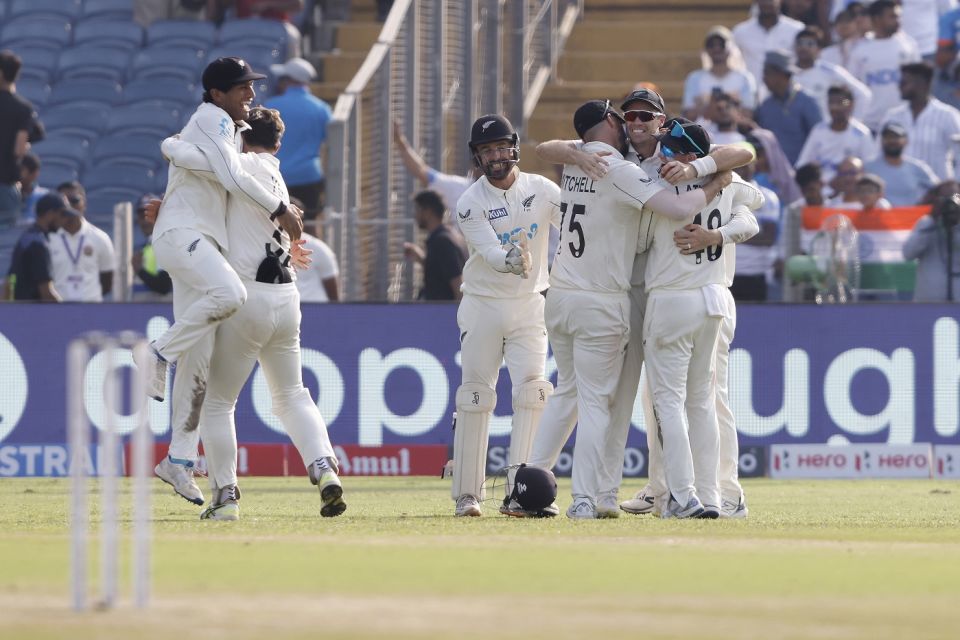 The New Zealand players rejoice after their first Test series win in India