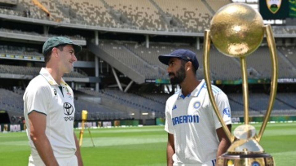 Jasprit Bumrah and Pat Cummins have a chat during the trophy photoshoot