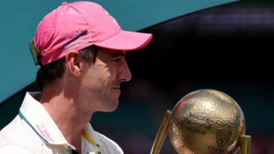 Job done: Pat Cummins with the Border-Gavaskar Trophy