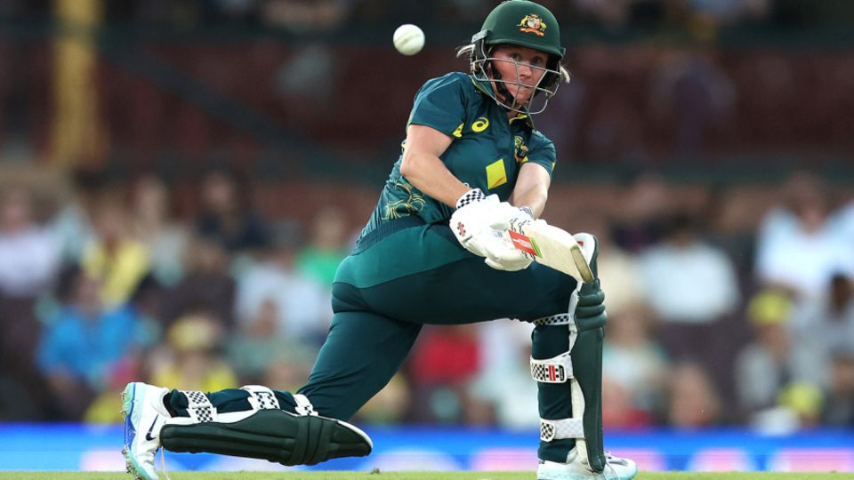 Beth Mooney swings into the leg side
