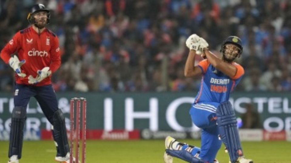 Shivam Dube launches a slog-sweep over midwicket