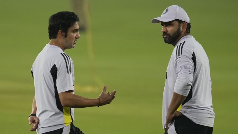 Gautam Gambhir interacts with Rohit Sharma at the training session