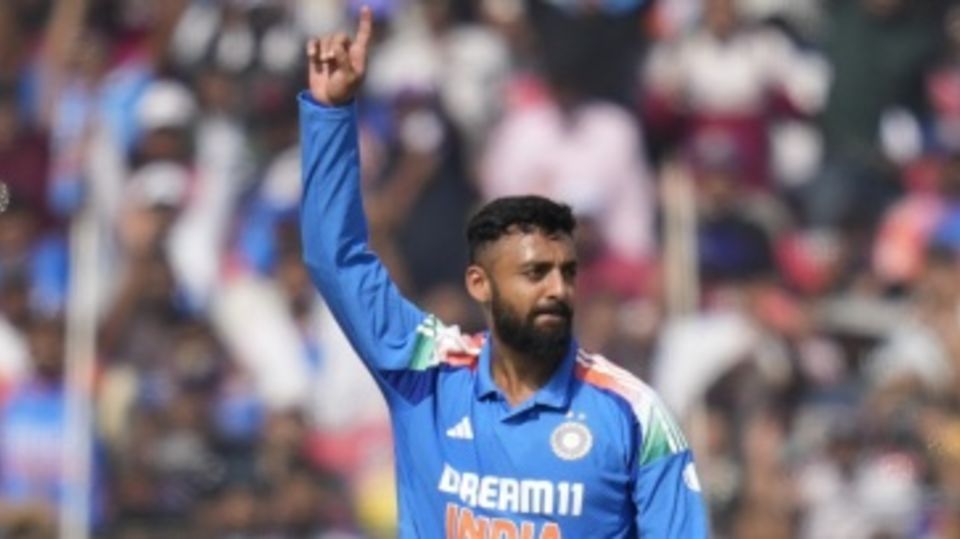 Varun Chakravarthy celebrates his first ODI wicket