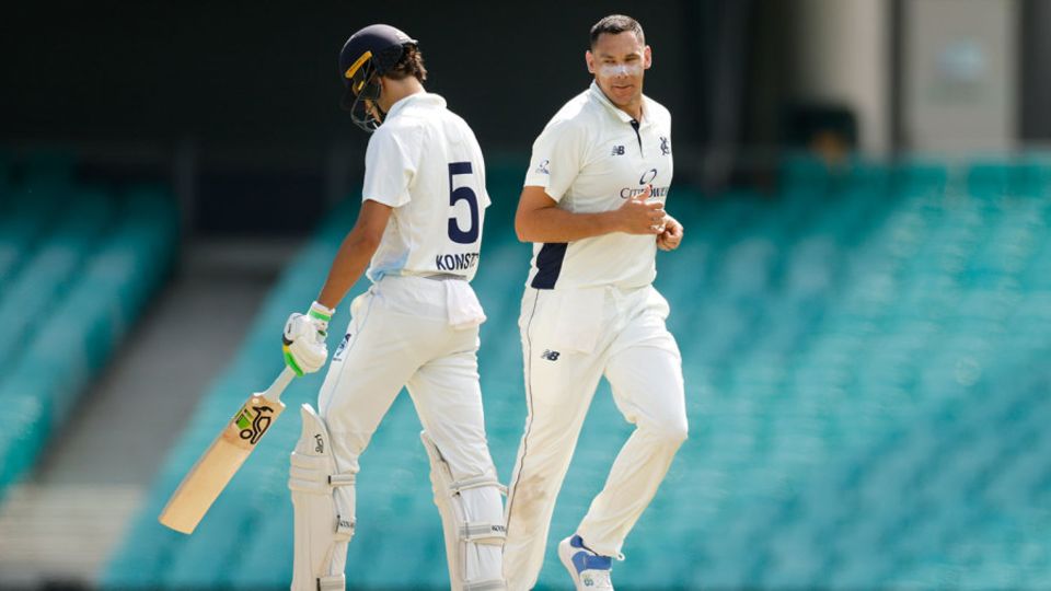 Scott Boland glances towards Sam Konstas after his dismissal