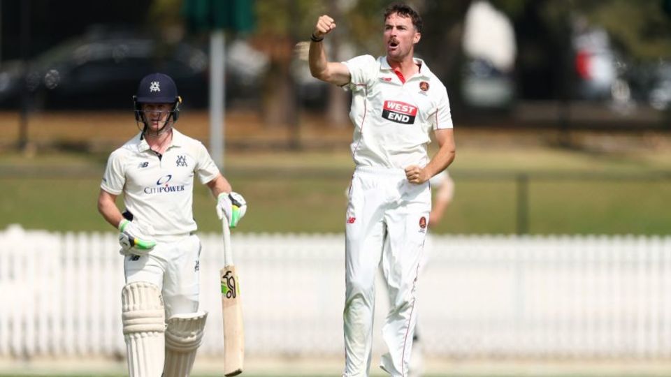 Jordan Buckingham celebrates the wicket of Sam Harper