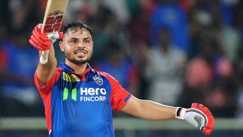 Ashutosh Sharma celebrates after bringing up his half-century