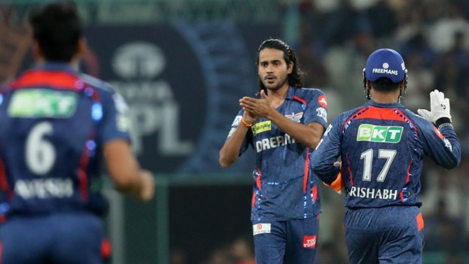 Digvesh Rathi pulls out his notebook celebration a safe distance away from Naman Dhir