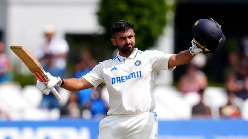 Karun Nair celebrates after recording his fourth first-class double-century