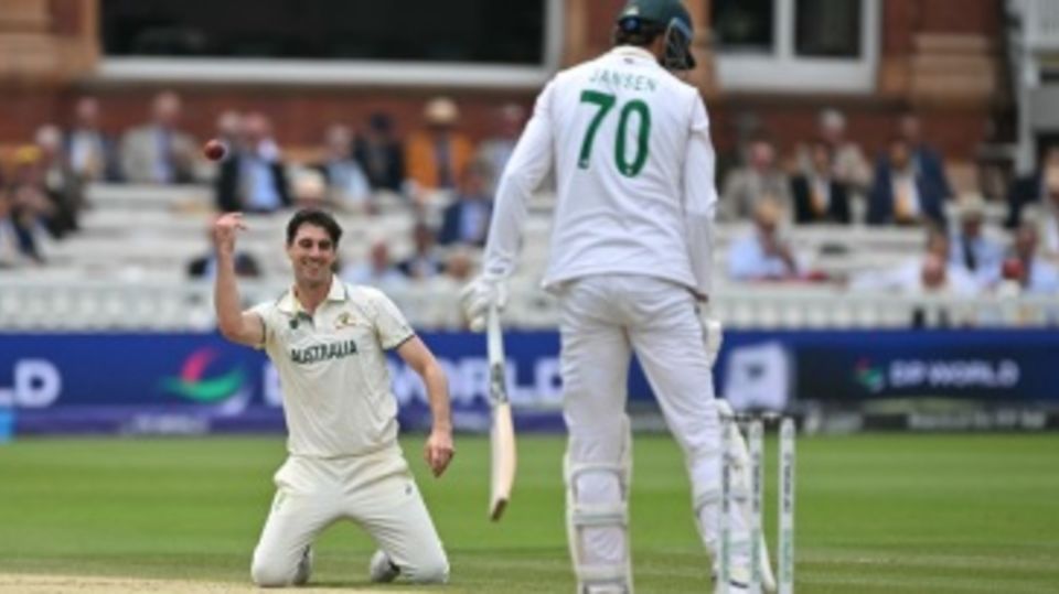 Pat Cummins kneels down to dismiss Marco Jansen caught and bowled