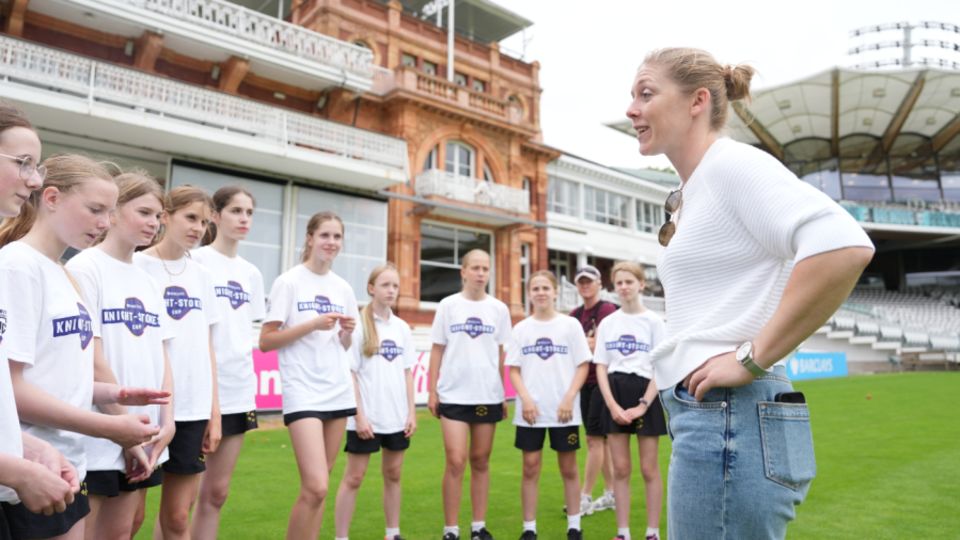 Heather Knight chats to schoolchildren at last summer's launch of the Knight-Stokes Cup