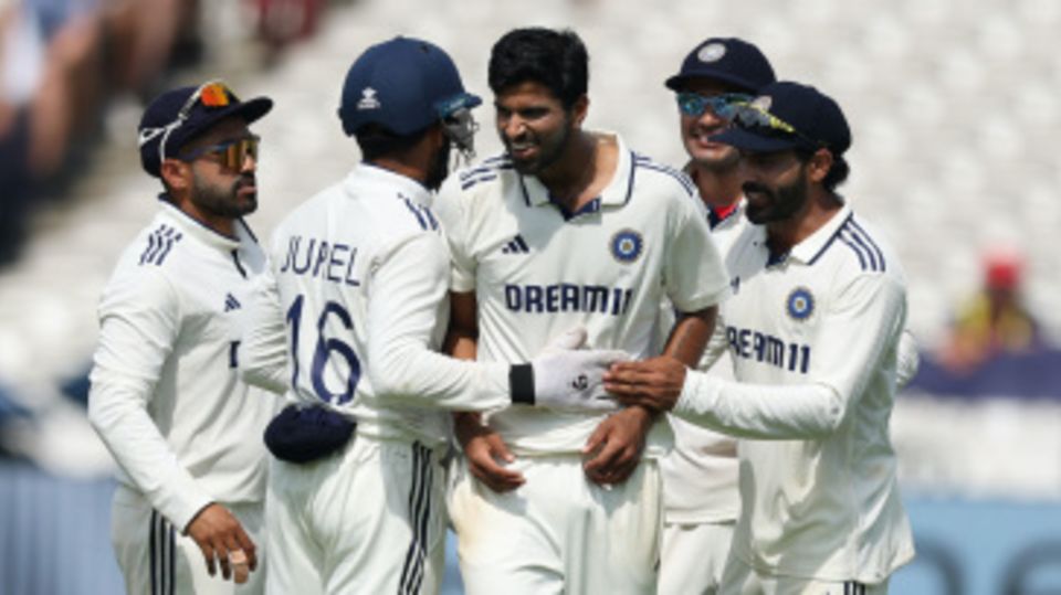 Washington Sundar celebrates the big wicket of Joe Root