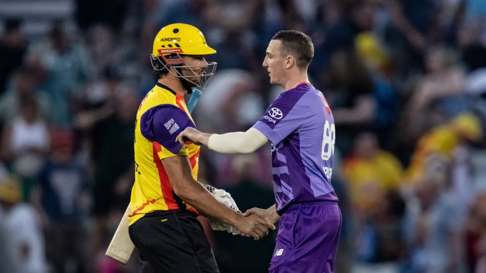 Marcus Stoinis shakes hands with Harry Brook