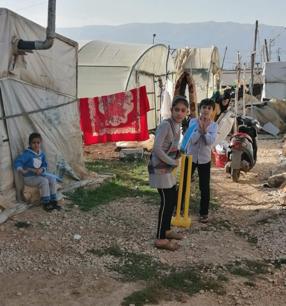 Kids play in the Al-Marj refugee camp in the Beqaa Valley
