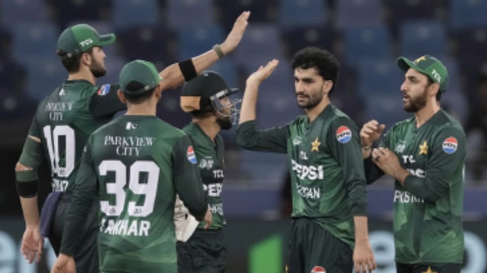 Sufiyan Muqeem celebrates a wicket with his teammates
