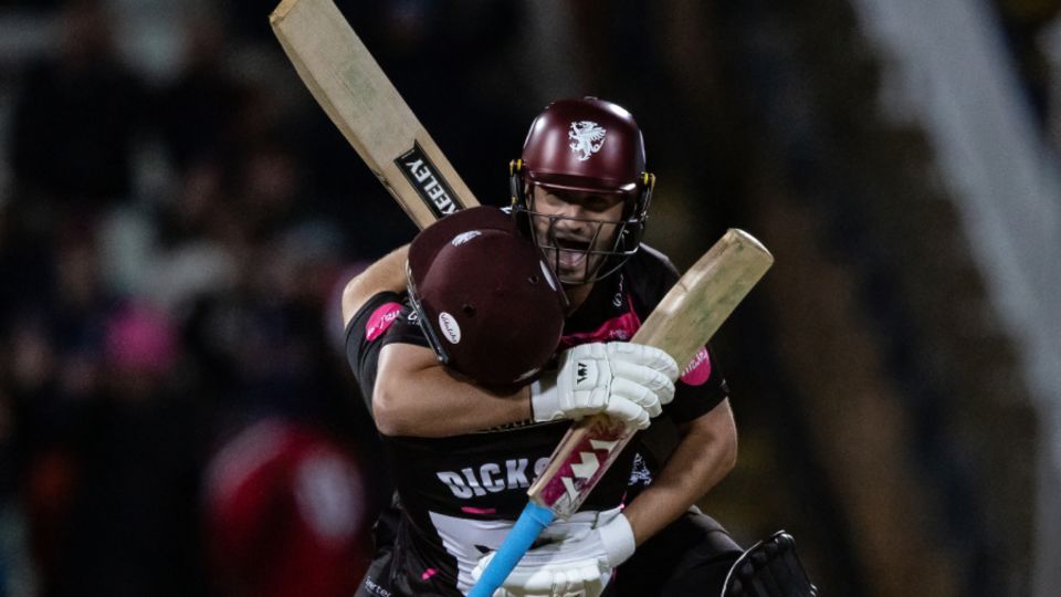 Lewis Gregory and Sean Dickson celebrate the moment of Somerset's victory