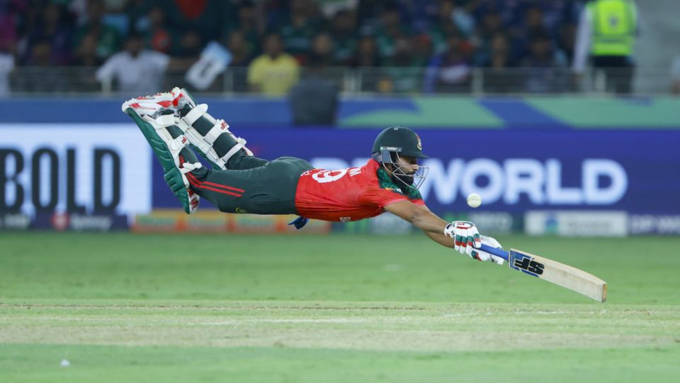 Shamim Hossain's full-stretch dive spares no effort