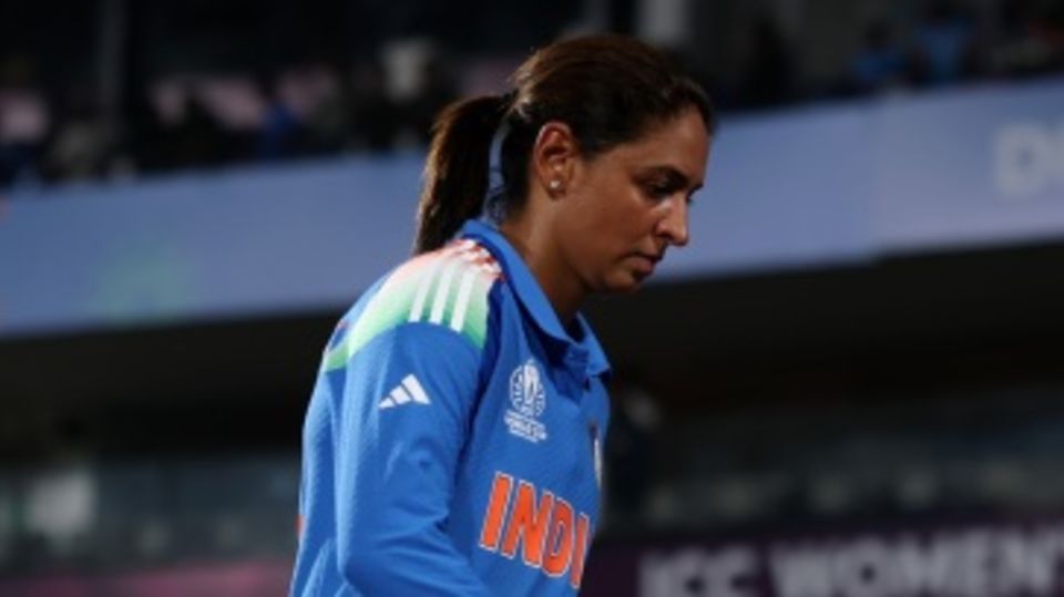 A dejected Harmanpreet Kaur walks off after India suffered a second-straight defeat