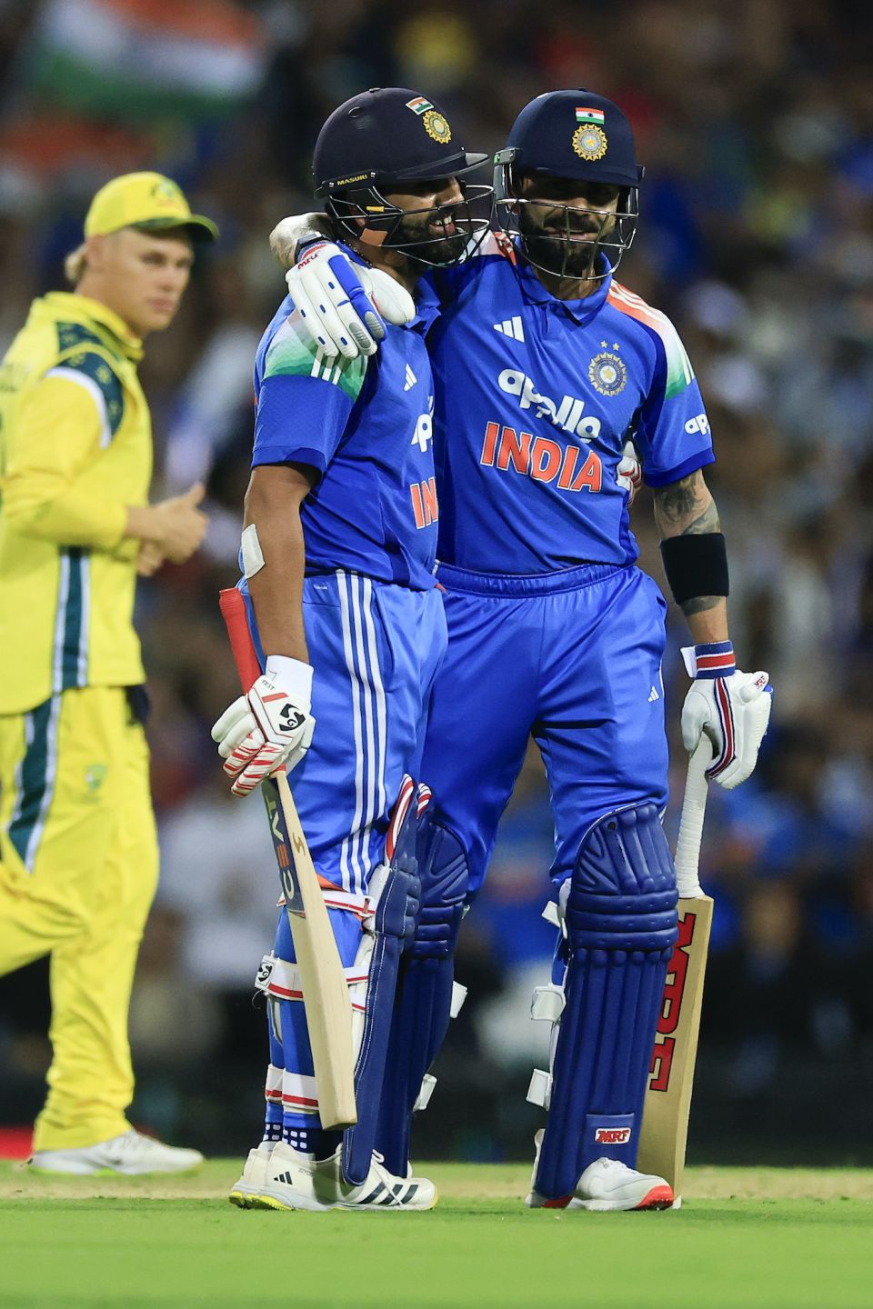 Virat Kohli congratulates centurion Rohit Sharma