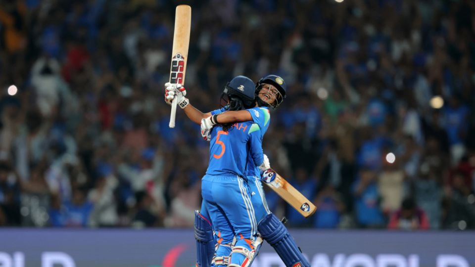 Jemimah Rodrigues and Amanjot Kaur embrace in the middle at the moment of victory